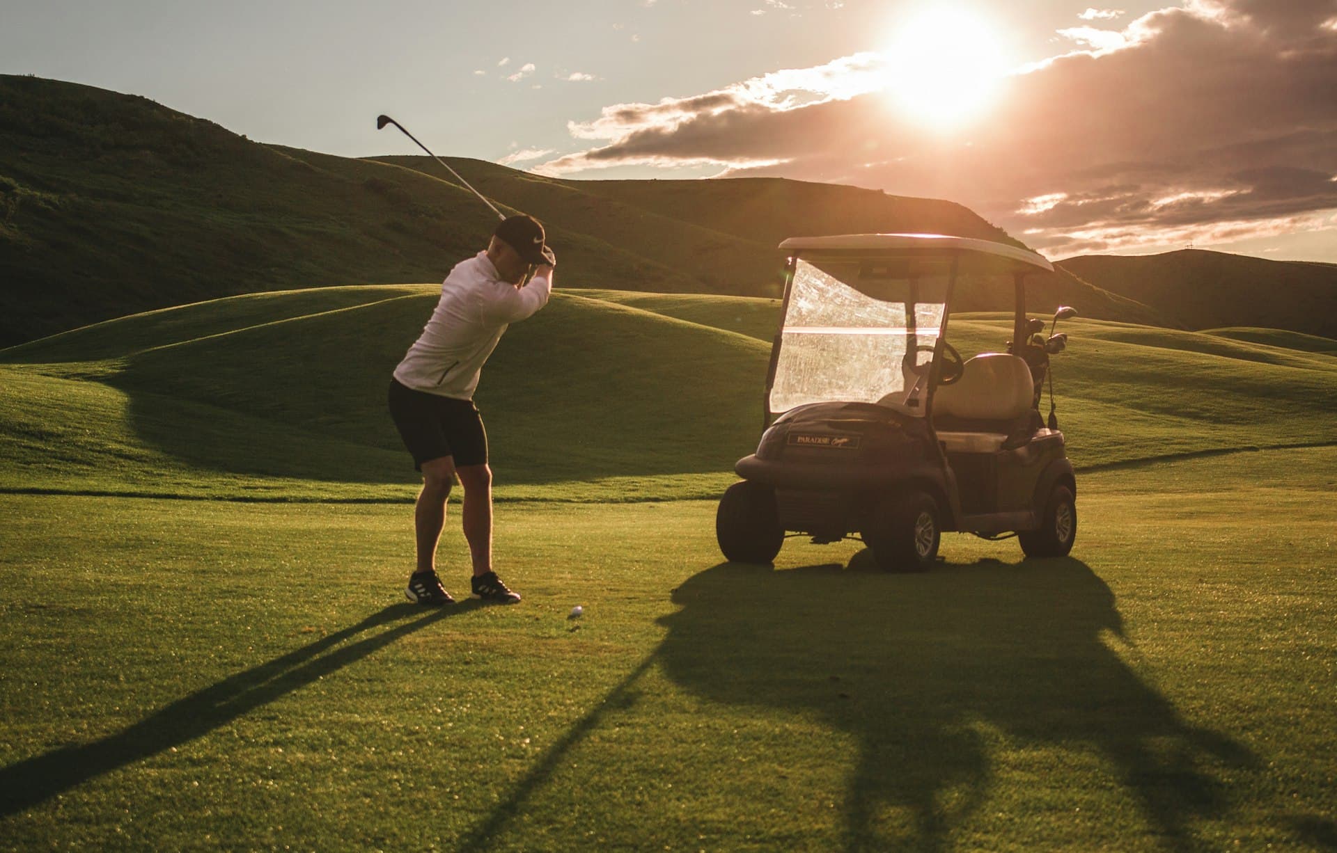 A corporate golf round at golden hour